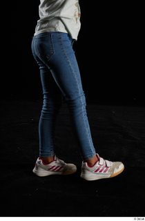 Elissa  1 blue jeans casual dressed flexing leg side…
